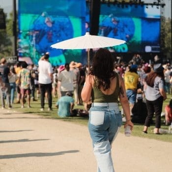 People crowd festival style at Just Like Heaven music festival 2023 at the Rose Bowl in Pasadena