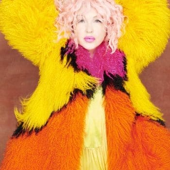 CYNDI LAUPER 2024 press photo in orange and yellow