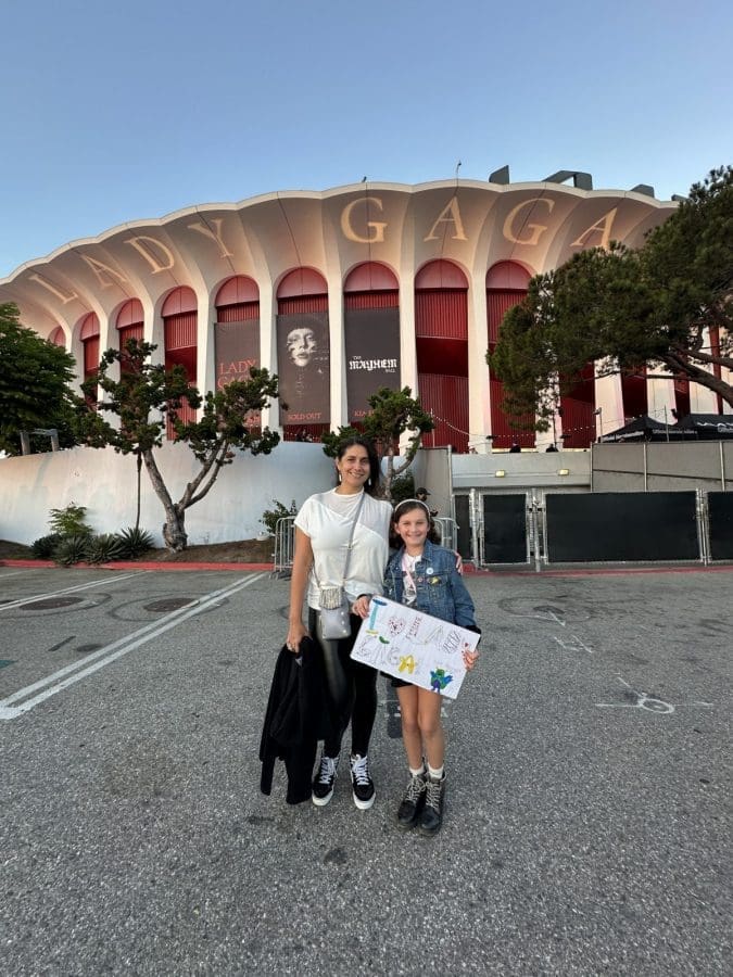 Sandra Burciaga Olinger of Grimy Goods with her daughter at Lady Gaga's Mayhem Ball at the Forum in Los Angeles.
